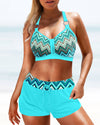 Hoch geschnittene Bikinis mit geometrischem Print