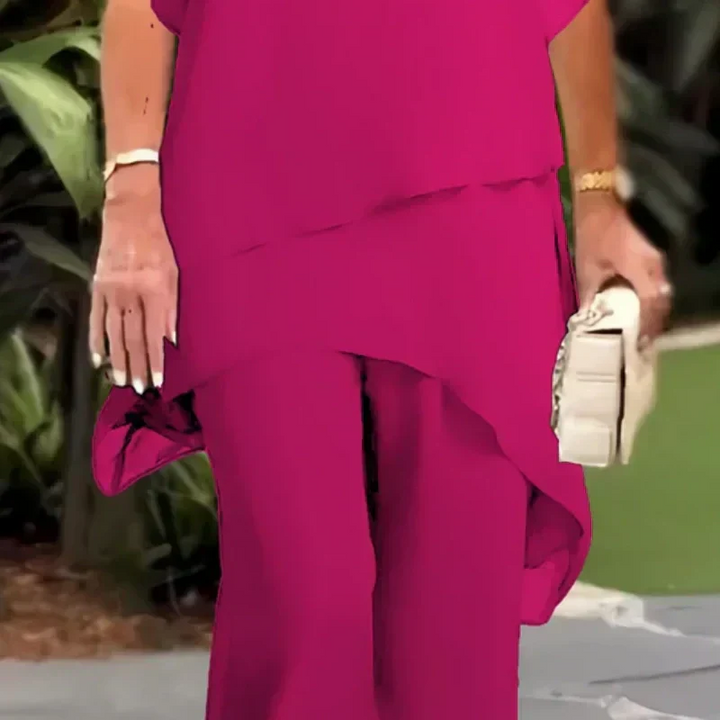 Charmigt set med oregelbunden topp Elegant set med vida byxor – Bekväma och perfekta för våren